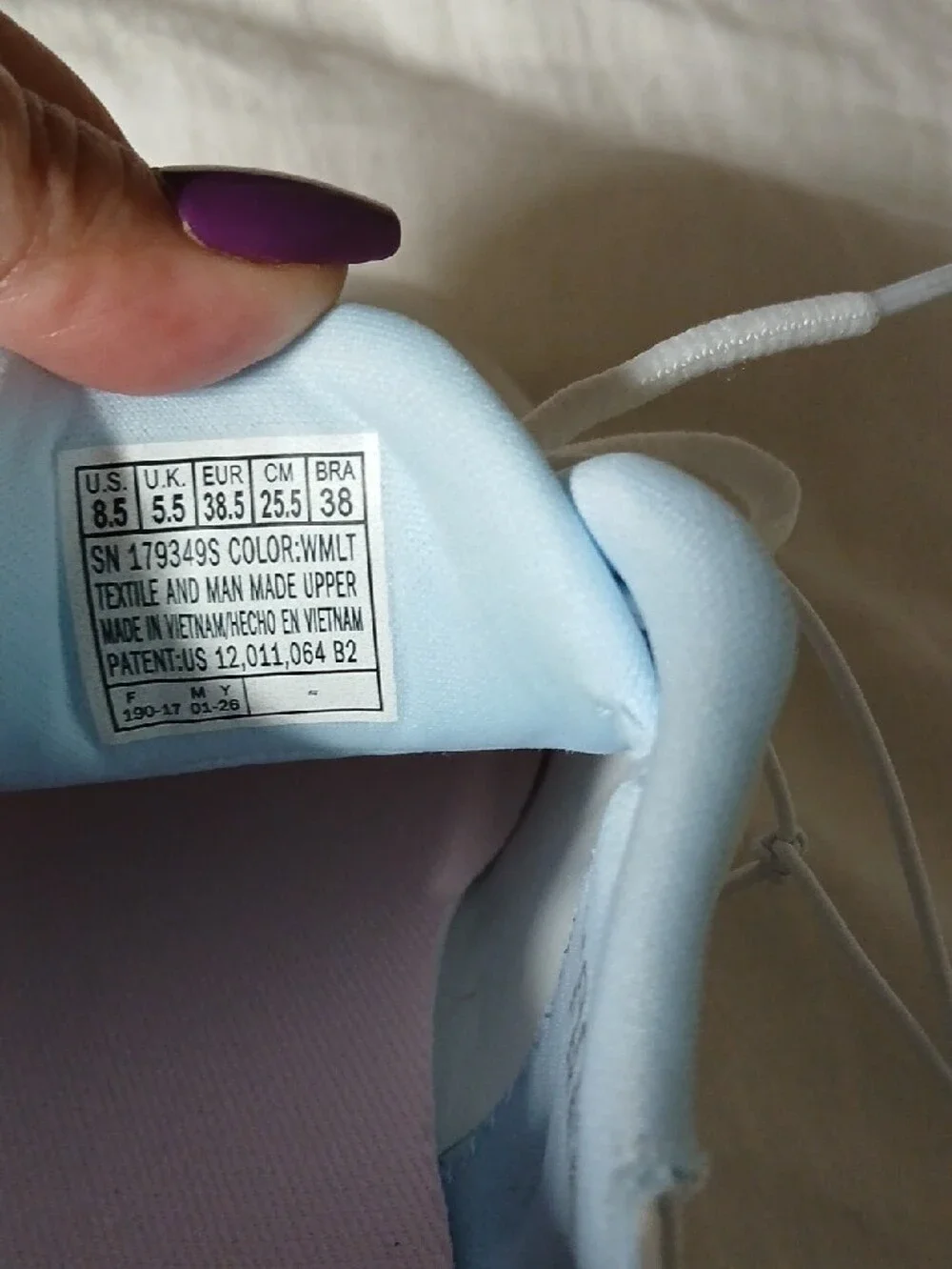 Skechers White Women's Athletic Sneakers with Iridescent Logo
